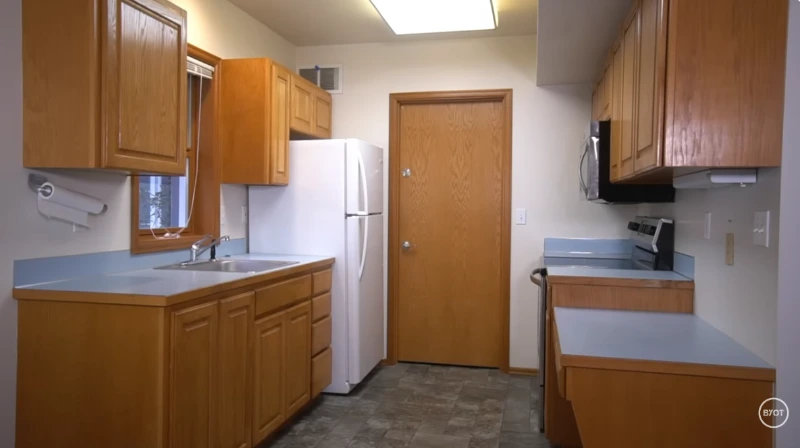 Small outdated kitchen countertop before renovation